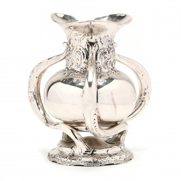 A LARGE STERLING SILVER