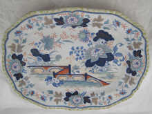 A large stoneware dish the