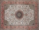 A LARGE TABRIZ COLORFULLY WOVE
