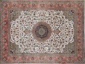 A LARGE TABRIZ COLORFULLY WOVE