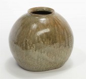 A LARGE TAN GLAZED CERAMIC VES