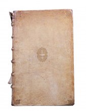 A large vellum-bound book of b