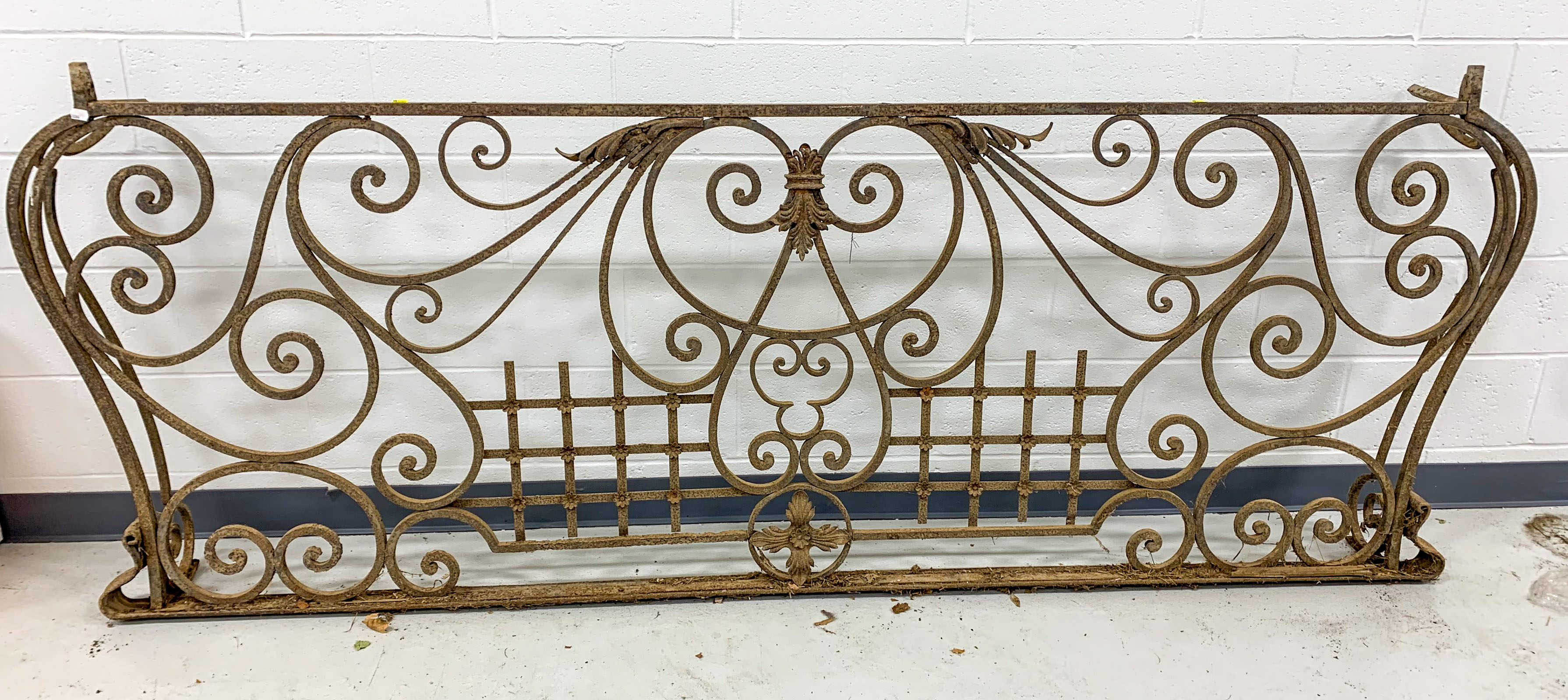 A LARGE WROUGHT IRON WINDOW GATE