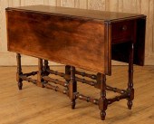 A LATE 19TH CENTURY GATE LEG T