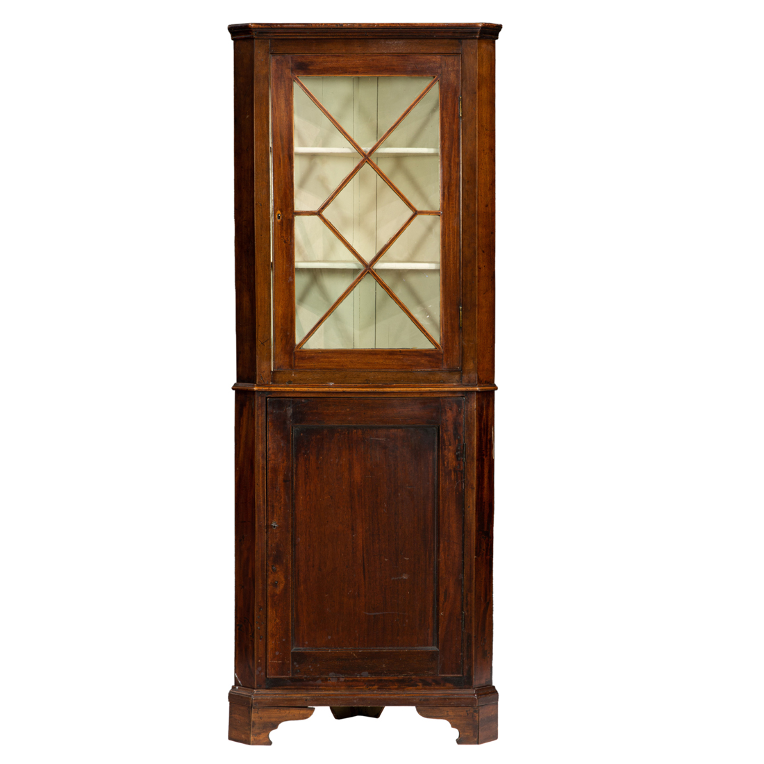 A LATE GEORGIAN MAHOGANY CORNER