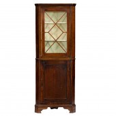 A LATE GEORGIAN MAHOGANY CORNE