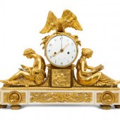 A Late Louis XVI Gilt Bronze a
