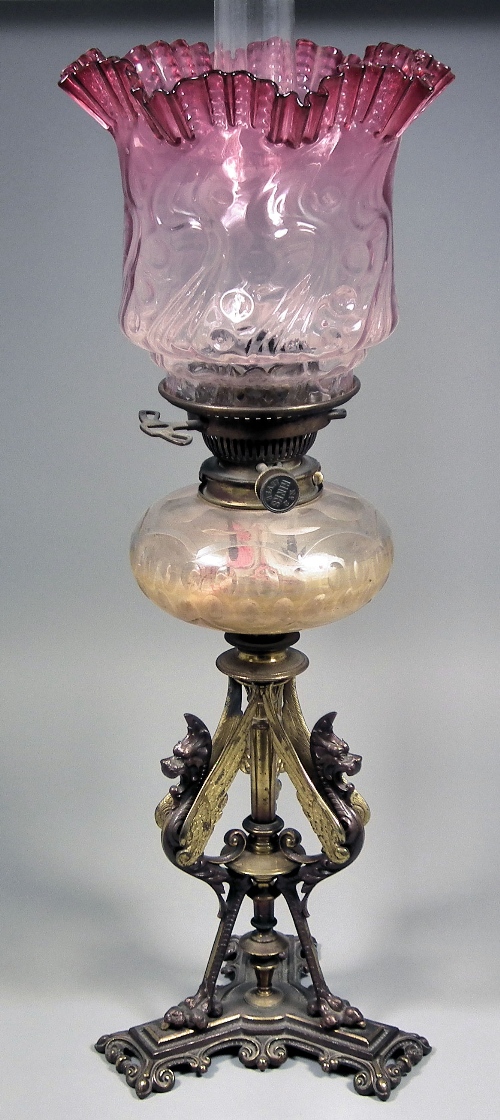 A late Victorian brass table oil