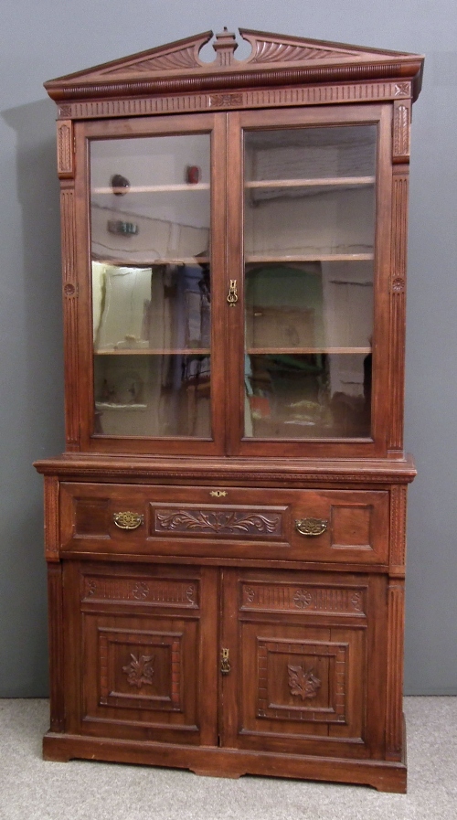 A late Victorian carved walnut