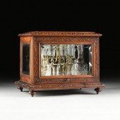 A LATE VICTORIAN CARVED WALNUT
