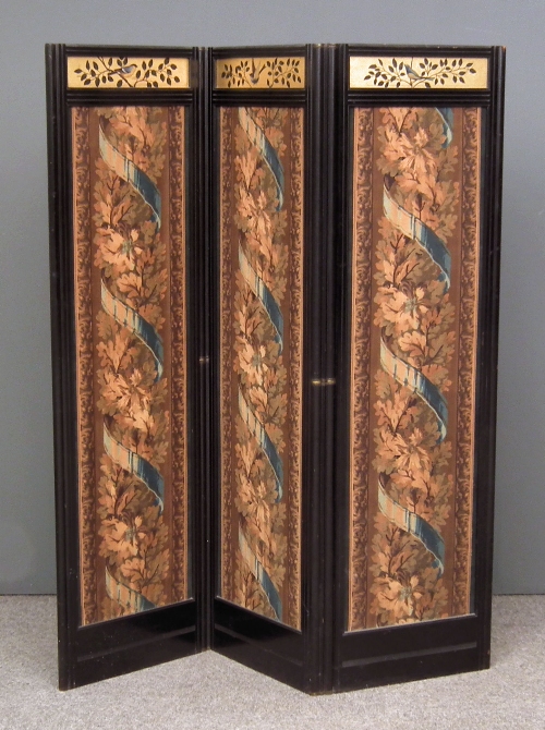 A late Victorian ebonised three