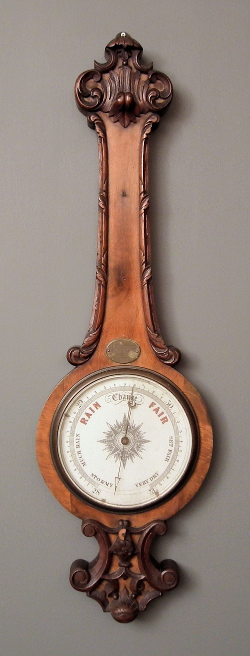 A late Victorian walnut cased wheel