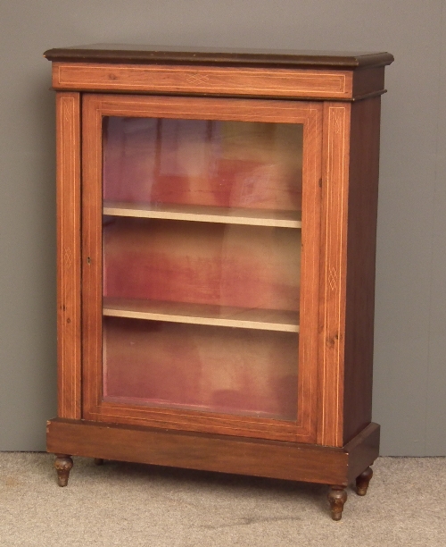 A late Victorian walnut dwarf