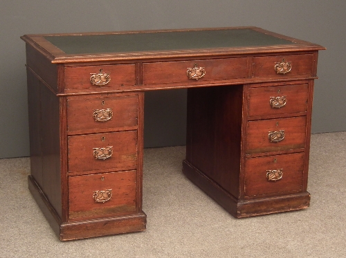 A late Victorian walnut kneehole