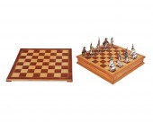 A LEAD FIGURAL CHESS SET WITH