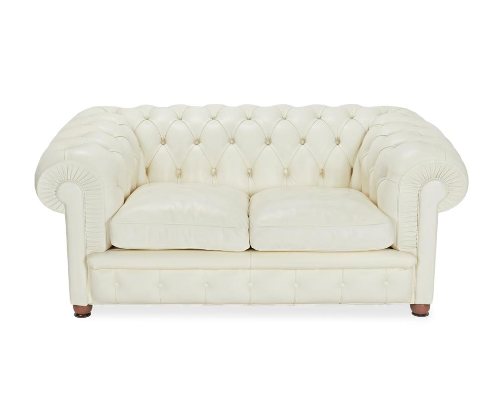 A LEATHER CHESTERFIELD SOFAA