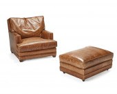 A LEATHER CLUB CHAIR AND OTTOM