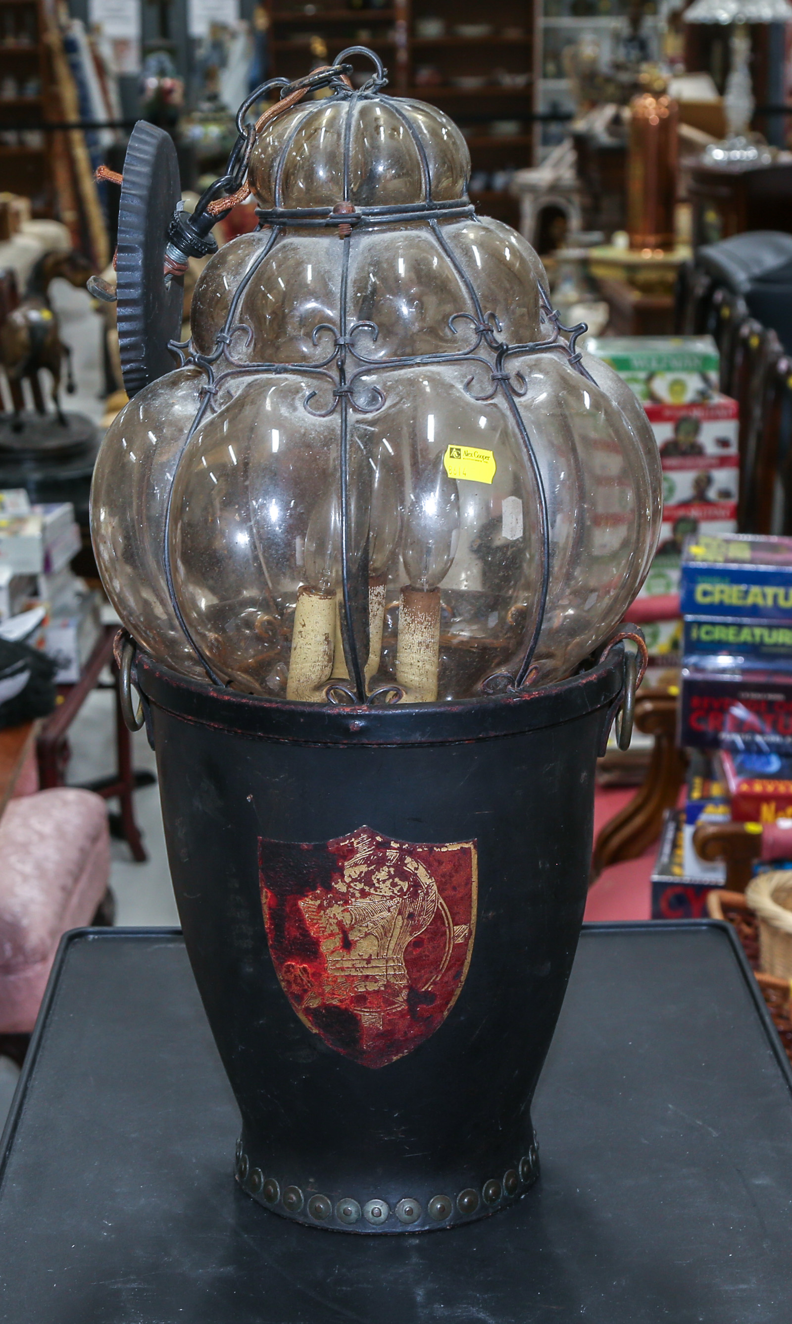 A LEATHER FIRE BUCKET & GLASS PORCH