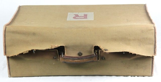 A leather suitcase with outer