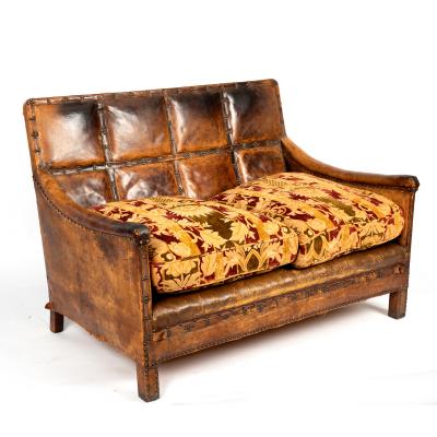 A leather two-seater sofa