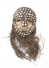 A Lega Tortoise Shell Mask. Le