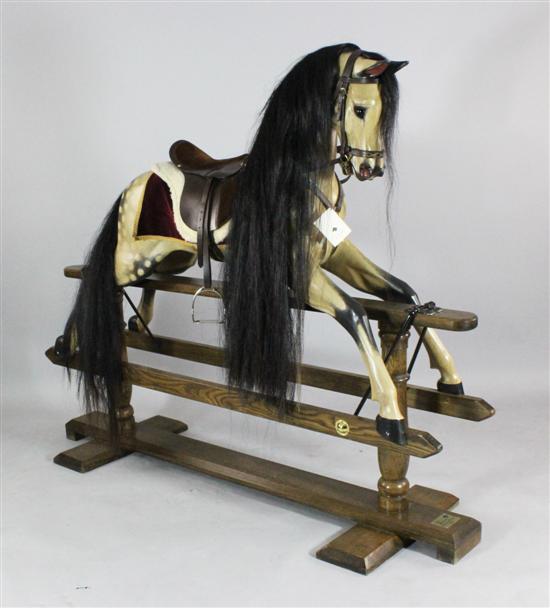 A Legends dapple grey rocking horse