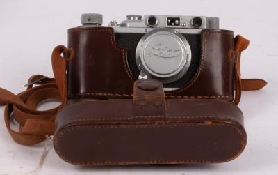 A Leica camera, marked Leica