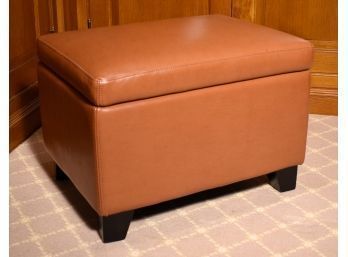 A lift top storage ottoman