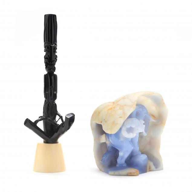 A LIGHT BLUE AGATE CARVING AND