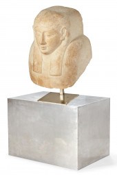 A LIMESTONE PORTRAIT BUST OF A