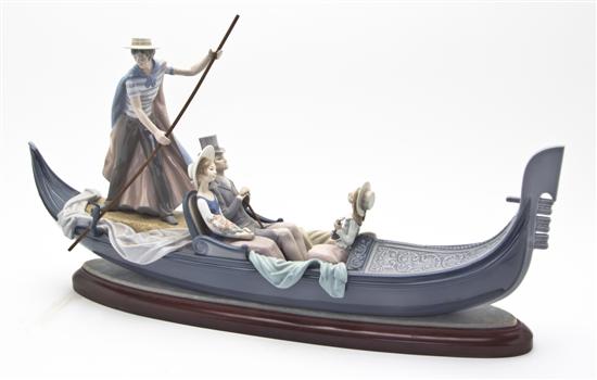 A Lladro Porcelain Figural Group In