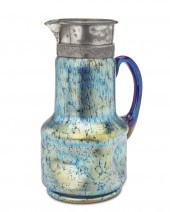 A LOETZ-STYLE SILVER PLATE-MOU