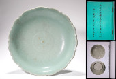 A LONGQUAN GLAZE CARVED 'LOTUS