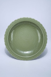 A LONGQUAN TYPE CARVED 'BAO XI