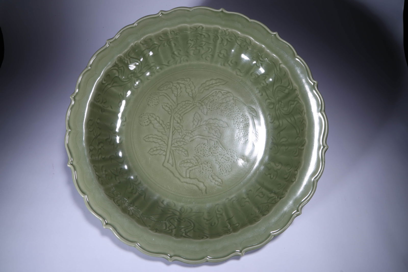 A LONGQUAN TYPE CARVED LARGE