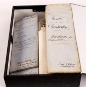 A loose leaf file box containi