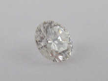 A loose polished round brilliant