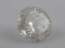 A loose polished round brilliant