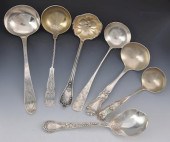 A Lot of Silver Serving Spoons