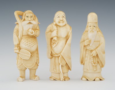 A Lot of Three Carved Ivory Figures