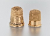A Lot of Two Gold Thimbles Con