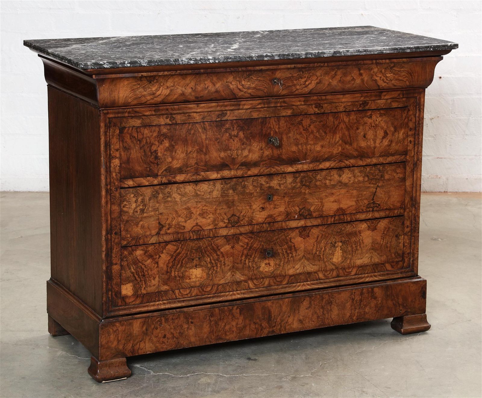 A LOUIS PHILIPPE FIGURED WALNUT