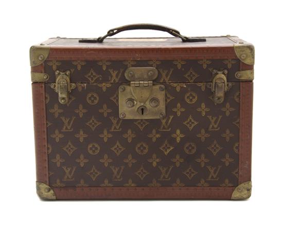 * A Louis Vuitton Hardsided