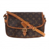 A LOUIS VUITTON MONOGRAM SOLOG