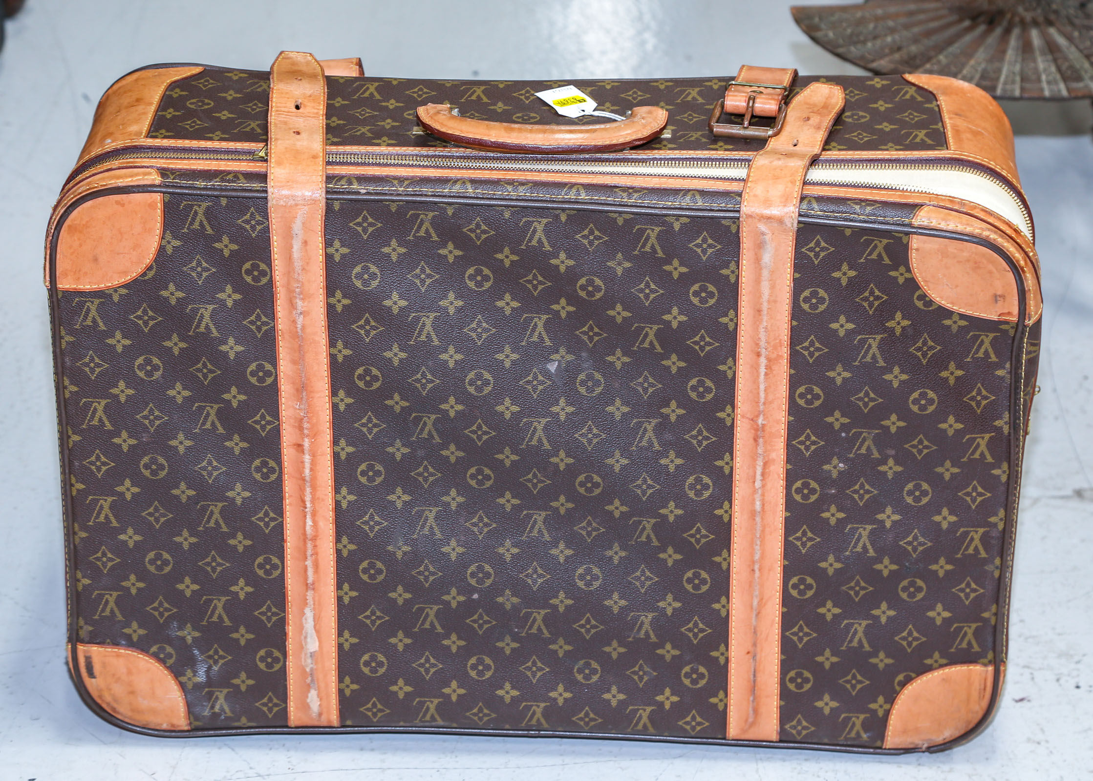 A LOUIS VUITTON-STYLE SUITCASE 18