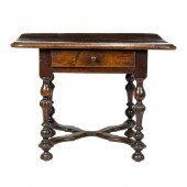 A LOUIS XIII WALNUT TABLE EARL