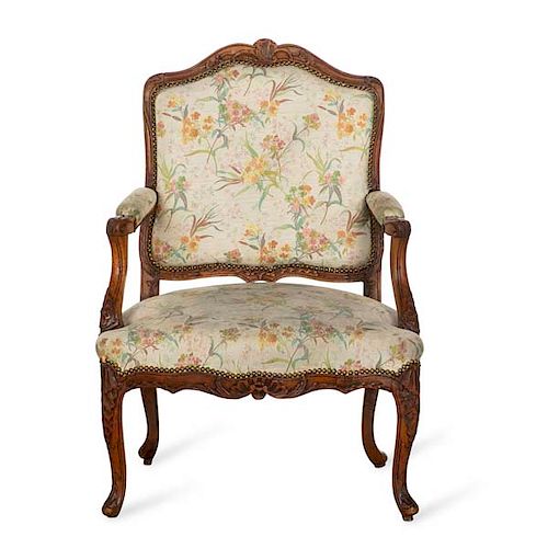 A LOUIS XV CARVED WALNUT FAUTEUIL ,
