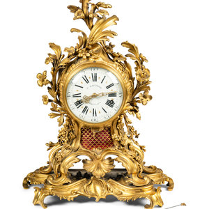 A Louis XV Gilt Bronze Mantel Clock