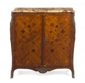 * A Louis XV Marquetry and Gil