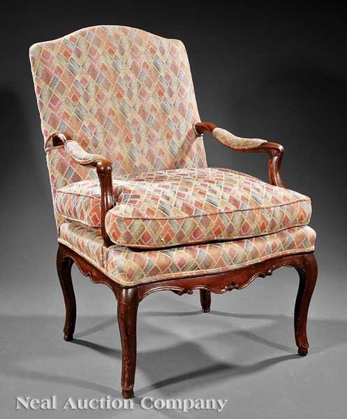 A Louis XV Provincial Carved Walnut